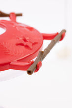Load image into Gallery viewer, Red hummingbird feeder with wooden perches and feeding ports on white background