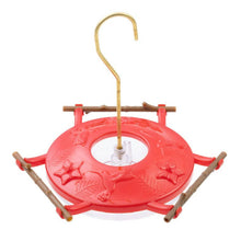 Load image into Gallery viewer, Red hummingbird feeder with decorative flower pattern and wooden perch frame