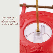Load image into Gallery viewer, Red hummingbird feeder with clear nectar reservoir and wooden perch pole