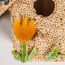 Load image into Gallery viewer, Bird seed wreath shaped like tulip flower with orange petals and green leaves