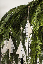 Load image into Gallery viewer, Three white ceramic Christmas tree ornaments with black patterns hanging from evergreen garland