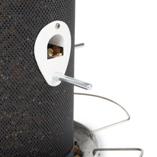 Load image into Gallery viewer, White oval-shaped bird feeder with viewing window mounted on black mesh cylinder