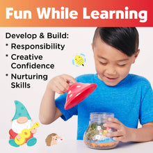 Load image into Gallery viewer, Child using Plant &amp; Grow Woodland Forest Terrarium Craft Kit with glass jar and watering tool
