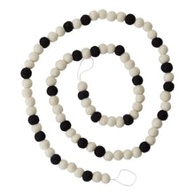 Load image into Gallery viewer, Black and white felt ball garland coiled in spiral, perfect for Christmas decorating