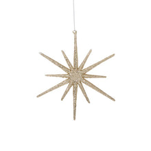 Load image into Gallery viewer, Gold glittery star-shaped Christmas ornament with multiple pointed rays hanging from string