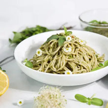 Load image into Gallery viewer, Fresh green pasta with pesto sauce and microgreens in white bowl