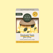 Load image into Gallery viewer, We The Wild Instant Sun Grow Lamp with adjustable bamboo design in yellow packaging