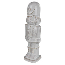 Load image into Gallery viewer, White glazed ceramic nutcracker figurine, traditional soldier design, holiday decoration