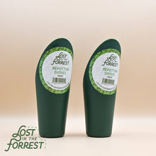 Load image into Gallery viewer, Two green repotting shovels from Lost in the Forrest brand with white circular labels