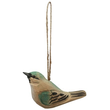 Load image into Gallery viewer, Hand-carved wooden bird ornament with teal and tan paint on jute twine hanger