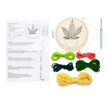 Load image into Gallery viewer, Plant punch needle embroidery kit with cannabis leaf design, colorful threads, and instructions