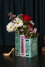 Load image into Gallery viewer, Triple Book Vase featuring Grimm's Fairy Tales with colorful floral arrangement and golden shoe