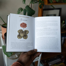 Load image into Gallery viewer, Open hardcover book showing illustrated geranium page with botanical drawing and text about plant history