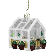 Load image into Gallery viewer, Glittery white glass greenhouse Christmas ornament with miniature potted plants inside