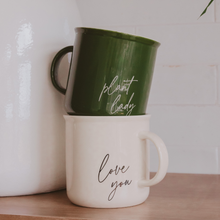 Load image into Gallery viewer, Two stacked coffee mugs with plant-themed text, green and white colors