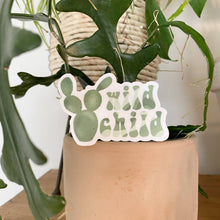 Load image into Gallery viewer, Wild Child decorative sticker featuring green prickly pear cactus design on potted plant