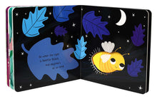 Load image into Gallery viewer, Open children's board book showing nighttime scene with glowing firefly and colorful leaves against starry sky