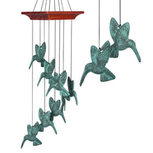 Load image into Gallery viewer, Decorative wind chime with verdigris hummingbird figures suspended from wooden platform in spiral formation