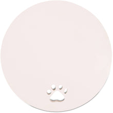 Load image into Gallery viewer, Pink circular garden stone memorial with white embossed paw print design