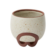 Load image into Gallery viewer, Cream speckled ceramic planter with terracotta rim and arched base legs