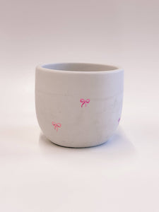 Pink Bow Planter With Drainage Hole: Raw Concrete 4"