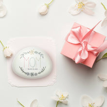 Load image into Gallery viewer, White oval garden stone with 'MOM you are so loved' text and floral wreath design