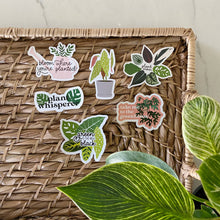 Load image into Gallery viewer, Plant-themed sticker collection in wicker basket featuring botanical phrases and leaf designs
