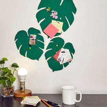 Load image into Gallery viewer, Three green monstera leaf-shaped cork boards mounted on white wall with notes and photos attached