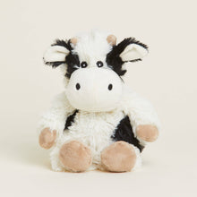 Load image into Gallery viewer, Plush black and white cow stuffed animal with pink hooves sitting upright