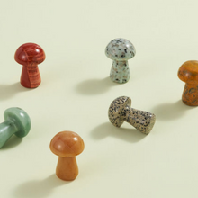 Load image into Gallery viewer, Collection of polished stone mushroom figurines in various colors and patterns on neutral background