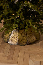 Load image into Gallery viewer, Hammered brass scalloped metal Christmas tree collar on herringbone hardwood floor