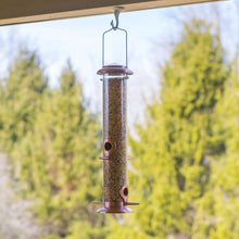 Load image into Gallery viewer, Copper finish tube bird feeder hanging outdoors with multiple feeding ports and perches