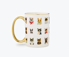 Load image into Gallery viewer, White porcelain mug with gold handle featuring colorful illustrated cats wearing accessories