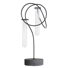 Load image into Gallery viewer, Modern decorative stand with black metal loops and glass test tubes on concrete base