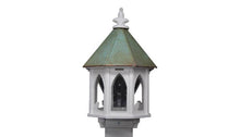 Load image into Gallery viewer, Octagonal white bird feeder with green copper roof and gothic arched openings