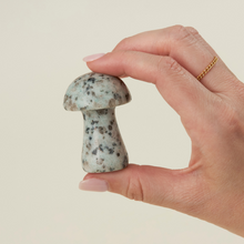 Load image into Gallery viewer, Hand holding decorative stone mushroom figurine with speckled gray and white pattern