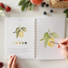 Load image into Gallery viewer, Watercolor painting tutorial book showing lemon illustration with color palette and step-by-step instructions