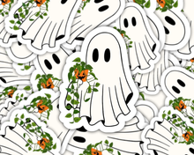 Load image into Gallery viewer, White ghost-shaped stickers with pothos plants and pumpkins scattered on white background