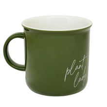 Load image into Gallery viewer, Green ceramic coffee mug with white 'plant lady' script text and cream interior