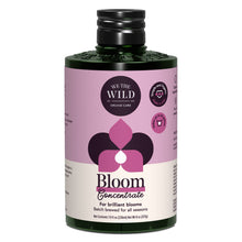 Load image into Gallery viewer, We The Wild Bloom Concentrate organic orchid fertilizer in dark green bottle with purple label