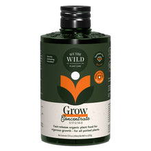 Load image into Gallery viewer, We The Wild Grow Concentrate organic plant food bottle with green and orange leaf design