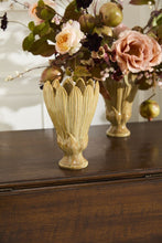 Load image into Gallery viewer, Prosper Vase in golden yellow ceramic with artichoke-inspired leaf petal design on wood surface
