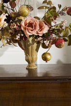 Load image into Gallery viewer, Prosper Vase in golden ceramic glaze holding lush floral arrangement with pomegranates and roses