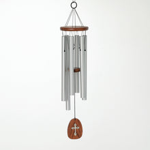 Load image into Gallery viewer, Medium-sized wind chime with silver tubes, wooden top and cross-decorated bottom piece