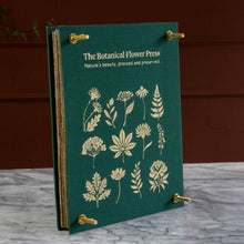 Load image into Gallery viewer, Green linen botanical flower press with gold foil plant designs and brass screws