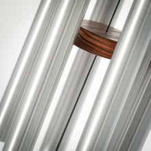 Load image into Gallery viewer, Wind chime with silver aluminum tubes and wooden cross striker with dark grain pattern