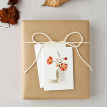 Load image into Gallery viewer, Vintage floral notecard with watercolor vase design tied with cream ribbon on kraft paper