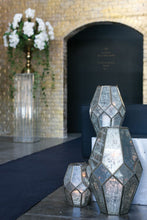 Load image into Gallery viewer, Three geometric mercury glass lanterns with faceted panels displayed on white surface