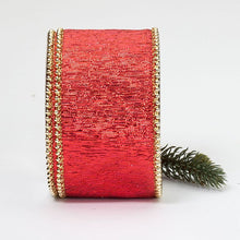 Load image into Gallery viewer, Red metallic ribbon with gold trim edges and small evergreen sprig decoration