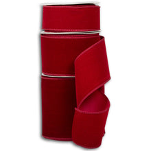 Load image into Gallery viewer, Red velvet ribbon with decorative stitched edges wound on white spools for holiday crafting